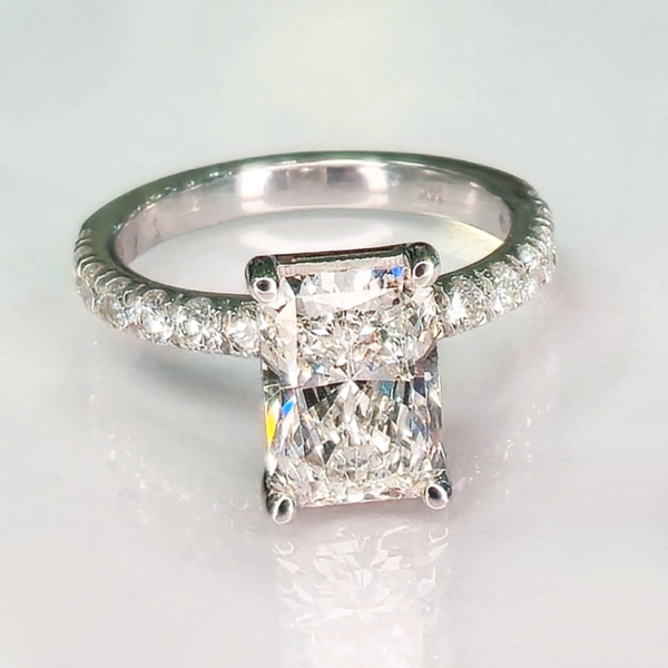 A bold princess-cut diamond set in white gold, designed for strong presence and clean, modern brilliance.