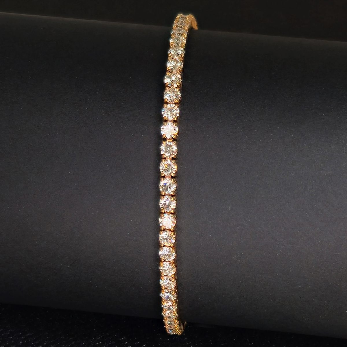 A classic warm design that brings together the brilliance of diamonds set against warm gold the catches the light from every angle.