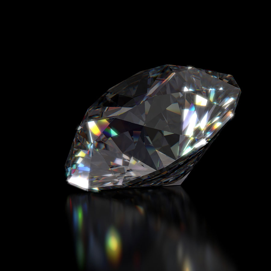 Diamond Education A large diamond on a black background catching all the light on it's facets